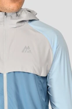 Breeze Windbreaker - Moonstone/Light Smoke Grey/Steel Blue 10 Breeze Windbreaker - Moonstone/Light Smoke Grey/Steel Blue -Cheap Unisex Activewear Store BREEZE WINDBREAKER MOONSTONE LT SMOKE GREY STEEL BLUE logo detail