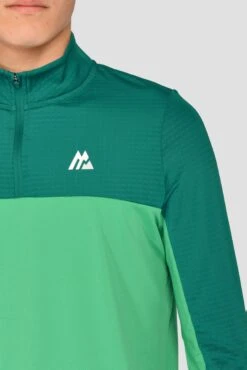 Junior Rush 1/4 Zip - Mountain Meadow/Deep Sea 11 Junior Rush 1/4 Zip - Mountain Meadow/Deep Sea -Cheap Unisex Activewear Store RUSH 1 4 ZIP MOUNTAIN MEADOW DEEP SEA close logo
