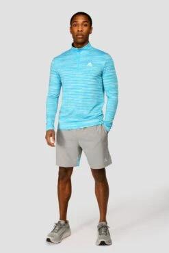 Trail 2.0 1/4 Zip - Neon Blue/White 7 Trail 2.0 1/4 Zip - Neon Blue/White -Cheap Unisex Activewear Store TRAIL 1 4 ZIP BLUEFISH ATOMIC BLUE WHITE front